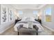 Main bedroom with large windows and neutral color palette at 1038 Heath Helms Rd, Monroe, NC 28110