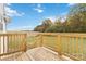 Wooden deck overlooking scenic backyard and farmland at 1038 Heath Helms Rd, Monroe, NC 28110