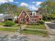 Brick house with a spacious yard and driveway, aerial view at 109 N York St, Lancaster, SC 29720