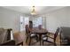 Classic dining room with hardwood floors and an elegant dining set at 109 N York St, Lancaster, SC 29720