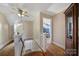 Upper hallway with hardwood floors and access to bedrooms at 109 N York St, Lancaster, SC 29720