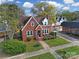 Red brick house with a nicely landscaped yard, aerial view at 109 N York St, Lancaster, SC 29720