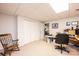 Basement office space with a rocking chair and built-in closet at 2640 Ironwood Dr, Hickory, NC 28602