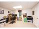 Basement home office with computer, desk, and ample storage at 2640 Ironwood Dr, Hickory, NC 28602