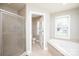 Main bathroom with corner tub, shower, and toilet at 2640 Ironwood Dr, Hickory, NC 28602