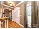 Bright entryway featuring hardwood floors and a classic white door at 2640 Ironwood Dr, Hickory, NC 28602