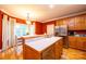 Kitchen features island, stainless steel appliances, and wood cabinets at 2640 Ironwood Dr, Hickory, NC 28602