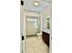 Modern bathroom with a glass shower, tiled floors and a wood vanity at 901 Linney Ln, Shelby, NC 28152