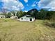 Rear view of house showcasing a modern design and backyard at 901 Linney Ln, Shelby, NC 28152
