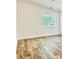 Bright bedroom with hardwood floors and a large window at 901 Linney Ln, Shelby, NC 28152