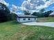 Newly built light gray house with dark gray metal roof at 901 Linney Ln, Shelby, NC 28152