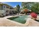 Large in-ground pool with water features at 1321 Linden Glen Dr, Matthews, NC 28104