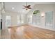 Gathering room with hardwood floors, a fireplace, and large windows at 2488 Birdie Ne Ln, Conover, NC 28613