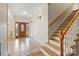 Tile entryway with hardwood stairs at 2488 Birdie Ne Ln, Conover, NC 28613