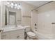 Full bathroom with tub, shower, and vanity at 2488 Birdie Ne Ln, Conover, NC 28613