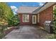 Brick patio with fire pit and gas grill at 2488 Birdie Ne Ln, Conover, NC 28613