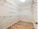 Large walk-in closet with wire shelving at 2488 Birdie Ne Ln, Conover, NC 28613