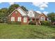 Brick home with landscaped yard at 2488 Birdie Ne Ln, Conover, NC 28613