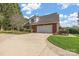Brick home with attached garage and driveway at 2488 Birdie Ne Ln, Conover, NC 28613