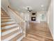 Living room with hardwood floors and fireplace at 2488 Birdie Ne Ln, Conover, NC 28613