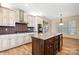 Kitchen boasts granite countertops, stainless steel appliances, and an island at 2488 Birdie Ne Ln, Conover, NC 28613