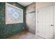 Bathroom with decorative window and tile shower at 2488 Birdie Ne Ln, Conover, NC 28613