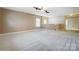 Spacious bedroom with neutral walls and carpet at 659 Hosta Dr, Fort Mill, SC 29715