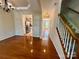 Hardwood floor dining room with kitchen and staircase views at 125 Snead Rd, Fort Mill, SC 29715