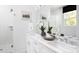 Modern bathroom with double vanity, large mirror, and walk-in shower at 417 Blairhill Rd # 12, Charlotte, NC 28217