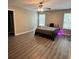 Large bedroom with ceiling fan, ample closet space, and plush carpeting at 7308 Gallery Pointe Ln, Charlotte, NC 28269
