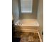 Bathroom with a large garden tub, perfect for relaxation at 7308 Gallery Pointe Ln, Charlotte, NC 28269