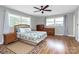 Spacious bedroom with wood floors and a ceiling fan at 12708 Hamilton Rd, Charlotte, NC 28273