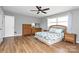 Well-lit bedroom with wood floors and ceiling fan at 12708 Hamilton Rd, Charlotte, NC 28273