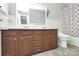 Bathroom features a double vanity and updated cabinets at 12708 Hamilton Rd, Charlotte, NC 28273