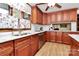 Bright kitchen with wood cabinets, stainless steel appliances, and an island at 12708 Hamilton Rd, Charlotte, NC 28273