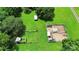 Aerial view of a property with a garden, chicken coop, and shed at 12708 Hamilton Rd, Charlotte, NC 28273