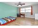 Bright bedroom with wood floors, ample natural light, and built-in dresser at 12708 Hamilton Rd, Charlotte, NC 28273