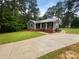 Gray house with long driveway and landscaped yard at 2403 Sutters Rd, Concord, NC 28027