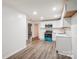 Modern kitchen with white cabinets, stainless steel appliances and turquoise stove at 804 Sowell St, Lancaster, SC 29720