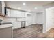 Modern kitchen with white cabinets, stainless steel appliances and quartz countertops at 804 Sowell St, Lancaster, SC 29720