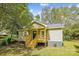 Tan house exterior with new porch and steps at 804 Sowell St, Lancaster, SC 29720
