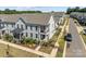 Aerial view of a townhome community, showcasing the subject property at 10193 Meeting House Nw Dr, Huntersville, NC 28078