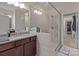 Bathroom boasts a large walk-in shower and granite vanity at 10193 Meeting House Nw Dr, Huntersville, NC 28078