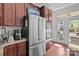 Modern kitchen with stainless steel appliances and access to backyard at 10193 Meeting House Nw Dr, Huntersville, NC 28078