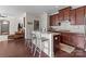 Kitchen with island seating and stainless steel appliances at 10193 Meeting House Nw Dr, Huntersville, NC 28078