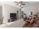 Bonus room with TV, exercise bike and comfortable seating at 10193 Meeting House Nw Dr, Huntersville, NC 28078