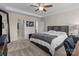Bright and spacious main bedroom with carpeted floors at 10193 Meeting House Nw Dr, Huntersville, NC 28078