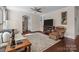 Bright living room with hardwood floors and neutral color palette at 10193 Meeting House Nw Dr, Huntersville, NC 28078