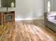 Living room features hardwood floors, fireplace, and large TV at 305 N Milford Dr, Salisbury, NC 28144