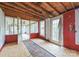 Sunroom with access to the backyard and requires updating at 519 S Mulberry St, Cherryville, NC 28021